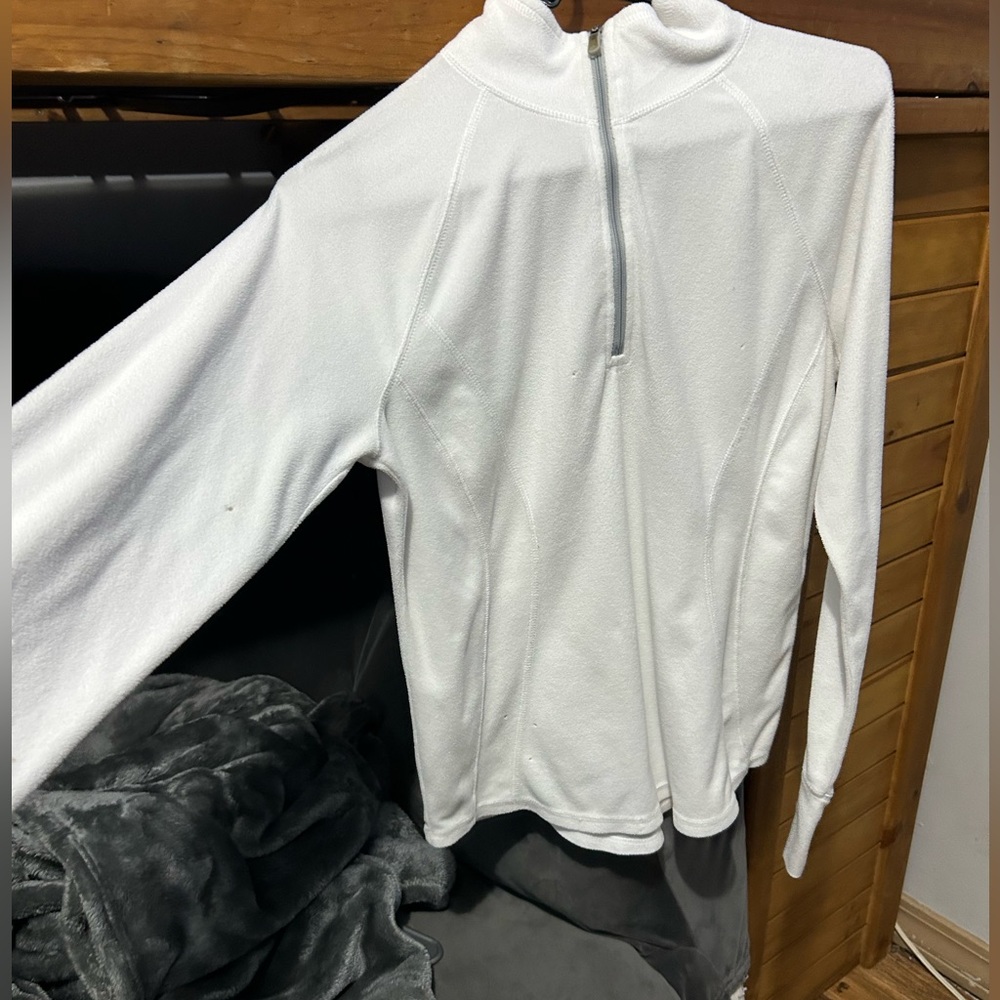 White half up zipper jacket.